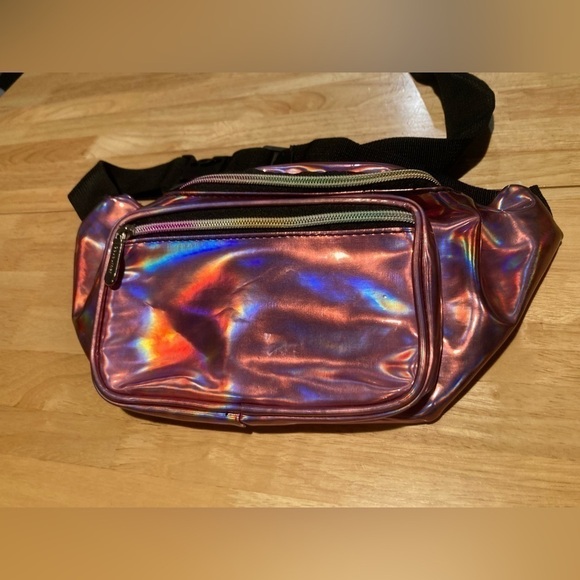 sojourner Handbags - Sojourner Fanny pack in a iridescent pink color. 2 big pockets with zippers